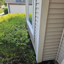 A-detailed-quality-soft-wash-will-transform-the-exterior-of-your-home-making-it-look-fresh-and-well-maintained-this-one-on-a-lakefront-property-in-Aurora 0